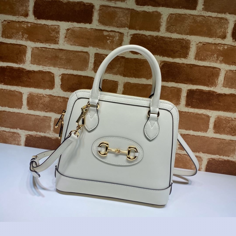 G*u*i top handle bags
